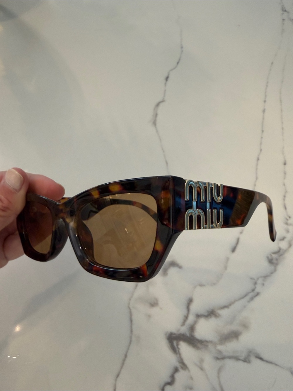 Miu Miu Style Tortoiseshell Sunglasses with Gold Logo Accents - Brown Lenses